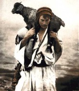 boy-with-his-goat-on-his-shoulders